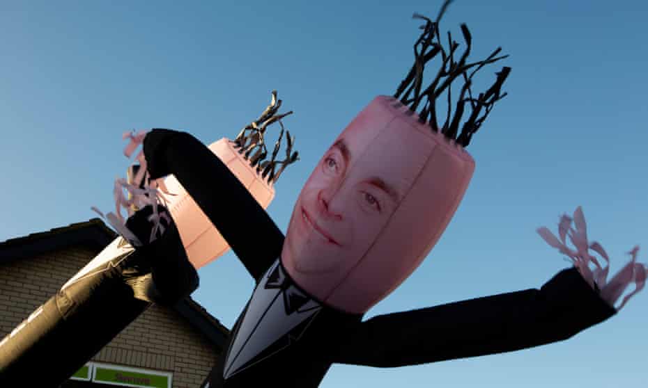 An inflatable Ant and Dec are seen at a business in Abergele.