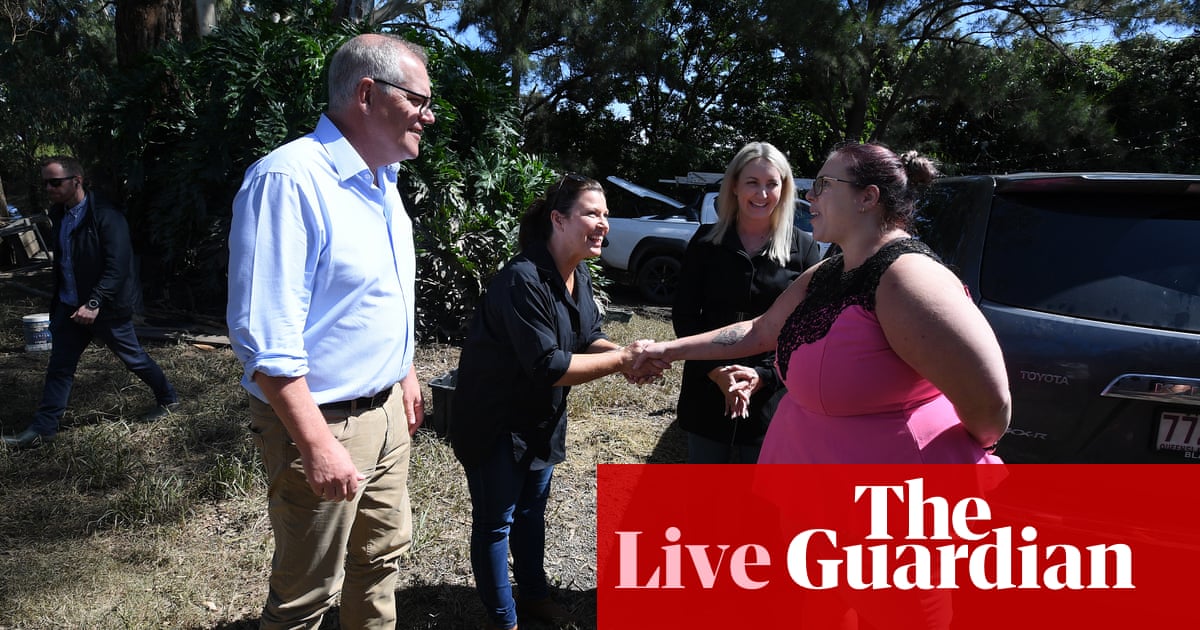 Australia live news update: Scott Morrison says Covid close contact isolation rule ‘redundant’, more mobile homes on way to NSW flood victims