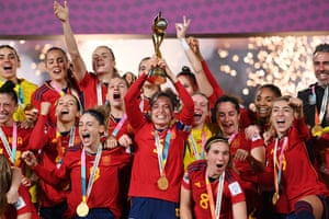 Ivana Andrés of Spain lifts the World Cup trophy.