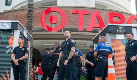 Police officers block the entrance to a Target in Midtown Miami amid protests against the store’s selling pro-LGBTQ+ merchandise, on 1 June.