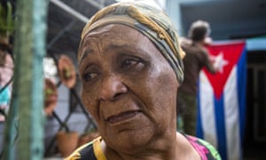 Outside her home in Havana, Rafaela Vargas mourns the death of Fidel Castro.