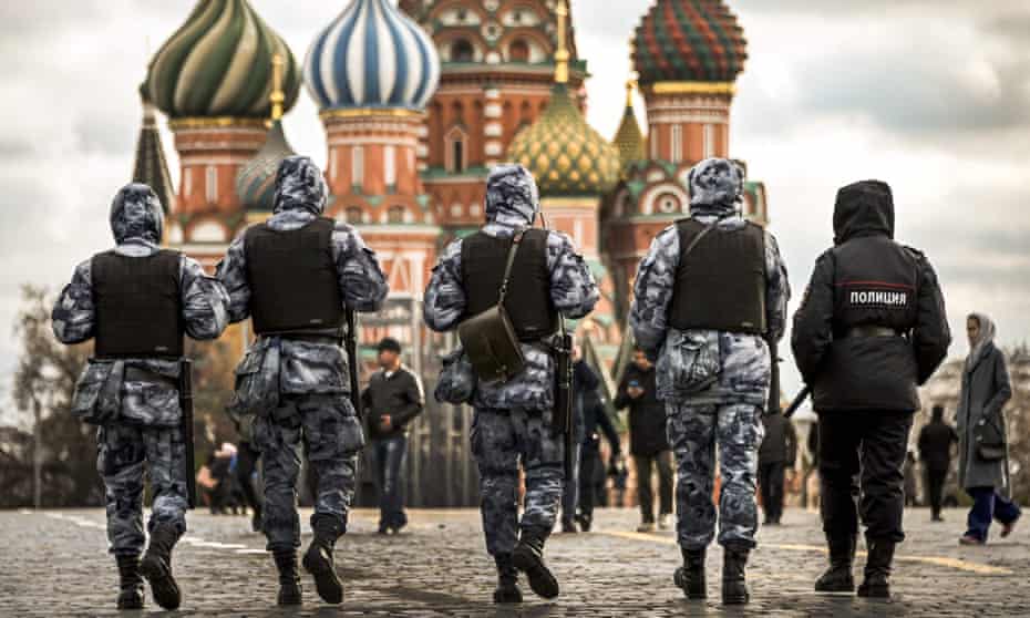 Russian police and national guard patrol Red Square in Moscow