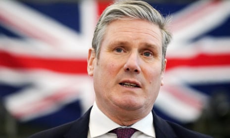 Labour leader Keir Starmer speaks against the background of a union flag.