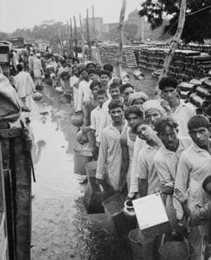 Muslim refugees at a ca mp outside Delhi in September 1947.