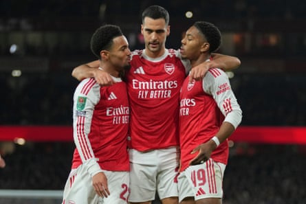 Arsenal's Ethan Nwaneri, left, celebrates aft scoring his side's opening goal