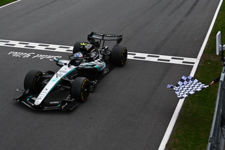 Mercedes’ Kimi Antonelli takes the chequered flag.
