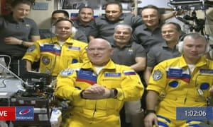 Russian cosmonauts Sergey Korsakov, Oleg Artemyev and Denis Matveyev are seen during a welcome ceremony after arriving at the International Space Station