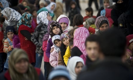 Syrians at refugee camp near the Bab al-Salam border crossing on the Turkish-Syrian border.