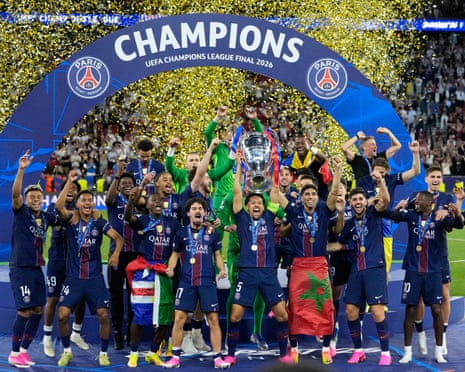 Marquinhos lifts the trophy with the Paris Saint-Germain team