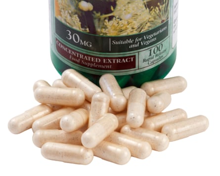 A small pile of oral capsules