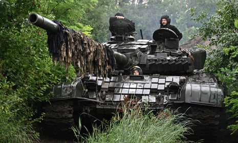 Ukrainian troops in a T-72 tank at a position in the Donetsk region last weekend