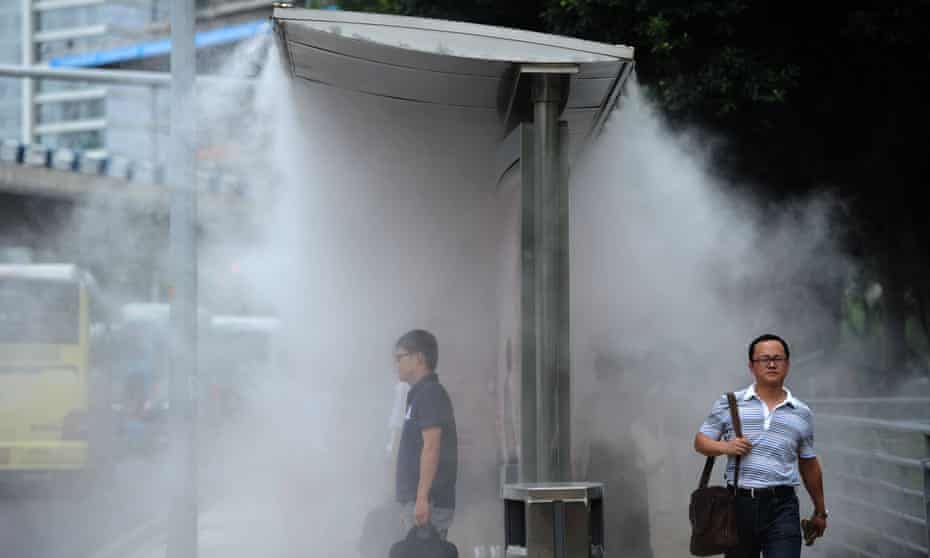Sprayers installed to cool people down at bus stops in Chongqing, China.