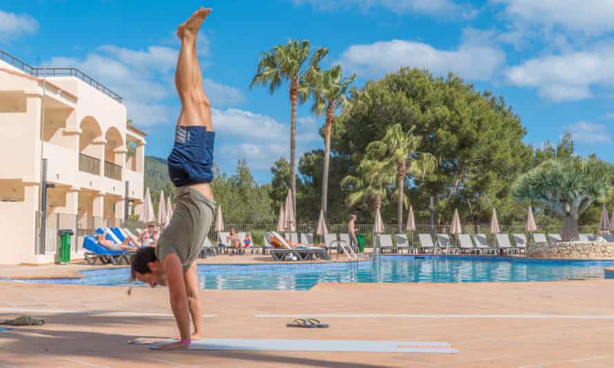 handstand by the pool