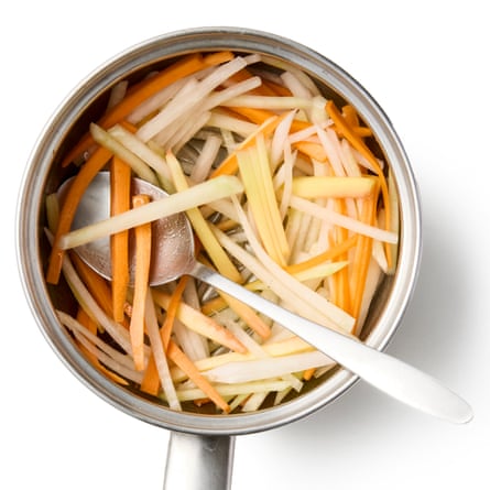 Felicity Cloake’s Bun Cha step 3. Heat the vinegar, sugar and salt in a small pan until the last are dissolved, stirring to dissolve the sugar and salt, then tip over the vegetables, mix well and leave to sit, tossing occasionally, ideally for at least a couple of hours.