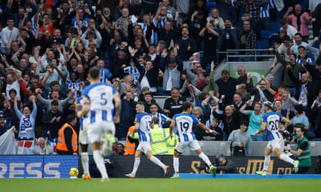 Brighton &amp; Hove Albion's Pascal Gross celebrates scoring their fourth goal with Jeremy Sarmiento and Julio Enciso.