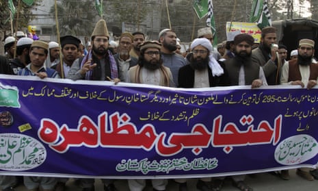 Pakistani supporters of Mumtaz Qadri at a rally in Lahore