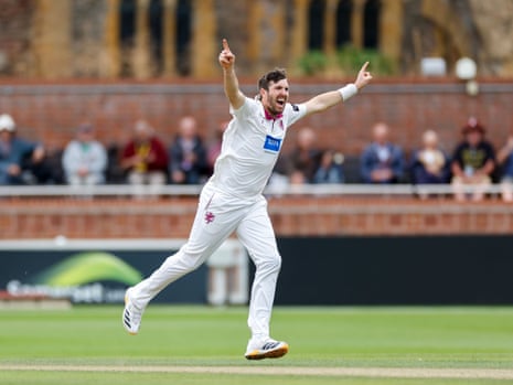Craig Overton of Somerset celebrates taking the wicket of Ben Kellaway