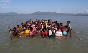 Rohingya refugees cross the Naf river to Bangladesh last year.