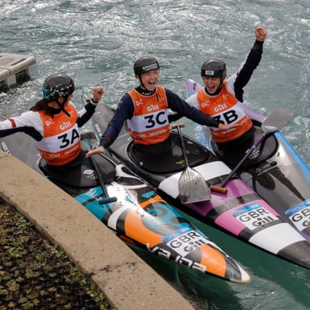 Mallory Franklin, Ellis Miller and Kimberley Woods of Great Britain celebrate as they realise they have won gold in the women’s canoe team event during day one of the ICF Canoe Slalom World Championships 2023 at the Lee Valley White Water Centre.