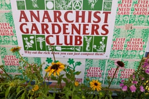 Anarchist Gardeners Club sign over some plants