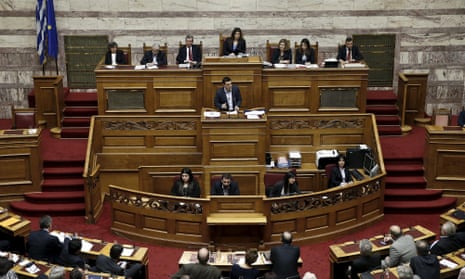 Greek Prime Minister Alexis Tsipras addresses lawmakers during a parliament session in Athens March 30, 2015. Tsipras said on Monday his government was ready to implement a deal struck with euro zone lenders in February but would not do it at any cost. REUTERS/Alkis Konstantinidis