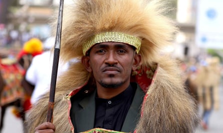Ethiopian musician Haacaaluu Hundeessaa, in traditional costume, 2019