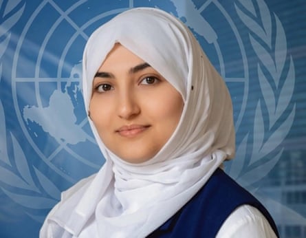 Portrait of Freshta Emady in a headscarf, with UN logo in background
