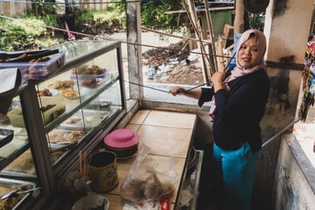 Neneng Muslimah, 45, runs a riverside family warteg in Jakarta.