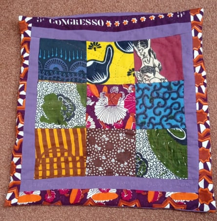 A quilted and embroidered cushion cover