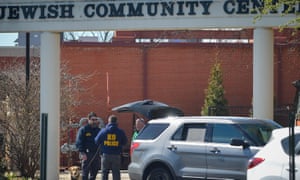 Police officers outside a Jewish community centre in Louisville, Kentucky, after it received bomb threats.