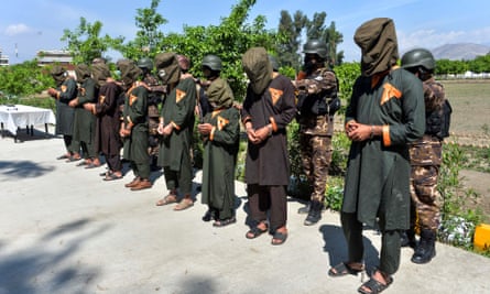 Afghan security forces with arrested alleged Isis fighters on 10 April 2019.