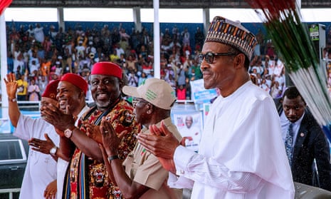 Nigerian President Muhammadu Buhari, right, at a campaign rally in Aba on 29 January ahead of elections in February.