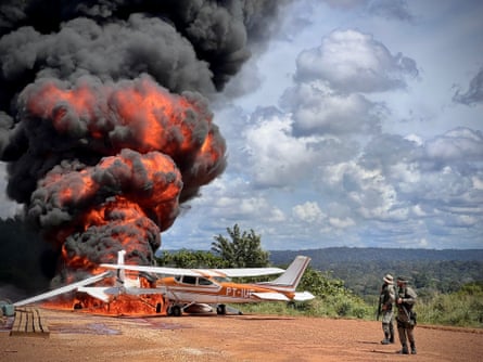 An aircraft is set alight on an airstrip