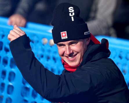 Franjo von Allmen punches the air in celebration