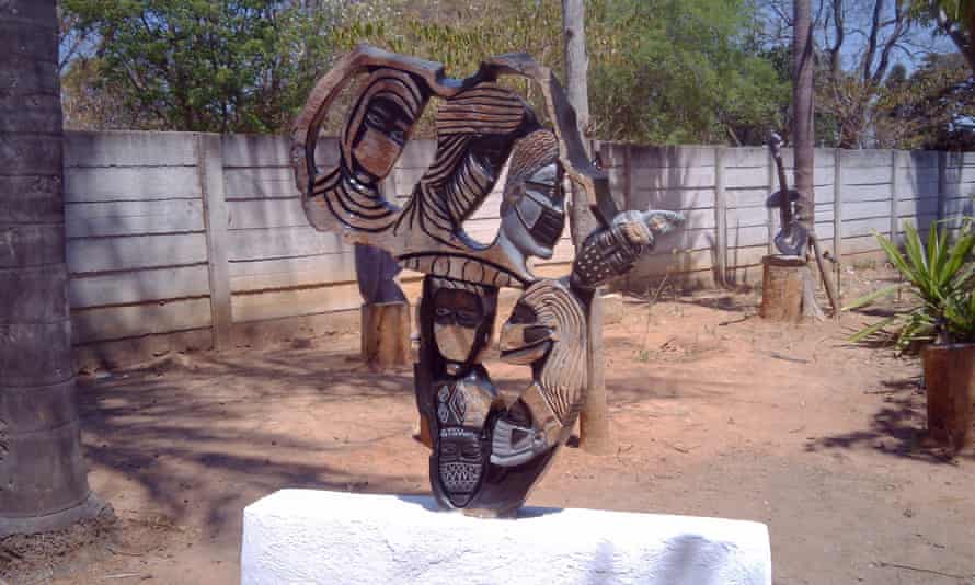 African women wearing a mask.