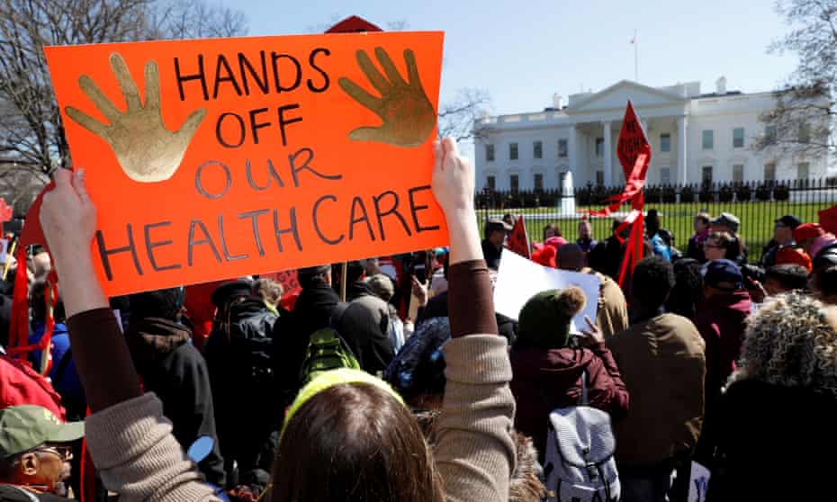 Healthcare demonstrators protest at the White House in Washington in 2017.