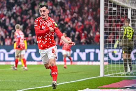 Paul Nebel of Mainz celebrates after scoring his side’s third goal in the 3-1 win over Dortmund.