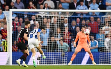 Enciso rocket halts Manchester City and confirms Brighton’s Europa League spot | Premier League 1 Brighton’s Julio Enciso unleashes a searing shot that flies into the top corner.