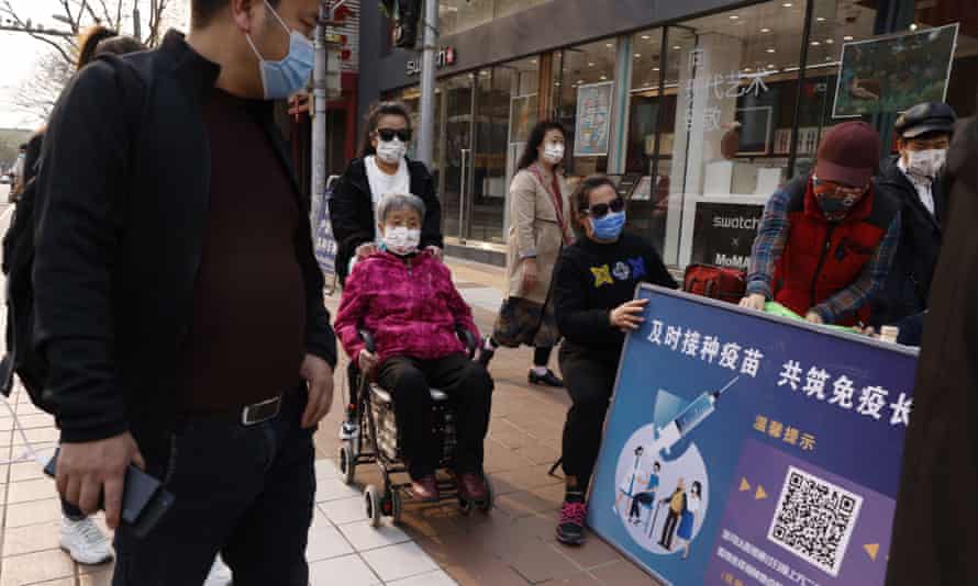 A stand promoting Chinese coronavirus vaccines in Beijing