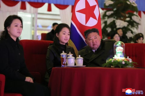 In this picture released by North Korean state media, Kim Jong-un, sit with his daughter Kim Ju Ae (centre) and his wife Ri Sol Ju.