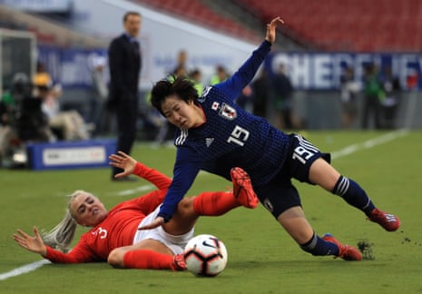 Jun Endo of Japan is challenged by Alex Greenwood of England.