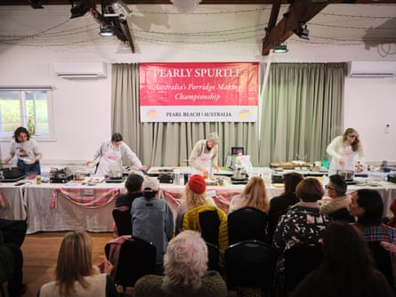 Competitors rush to cook their porridge in the first heat of the Pearly Spurtle Porridge Competition.