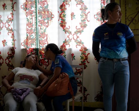 Yaritza García’s colleagues comfort her after a prayer during Alexandra’s funeral