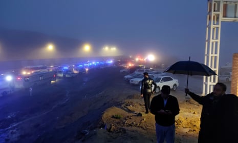 In this photo provided by Moj News Agency, rescue teams' vehicles are seen near the site of the incident of the helicopter carrying Iranian president Ebrahim Raisi in Varzaghan in northwestern Iran.