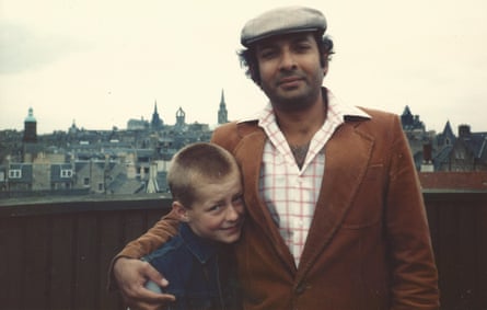John with Eldridge Buultjens, his adoptive father.