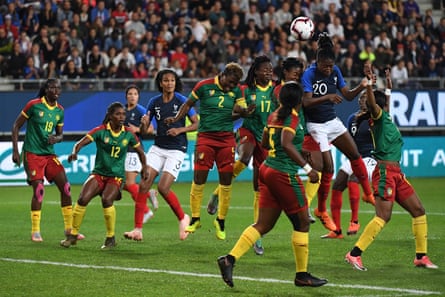 France’s defender Kadidiatou Diani heads the ball during the match against Cameroon at the Stade des Alpes.