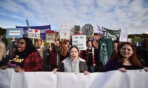 Demonstrators march through the streets of Belfast ahead of a meeting of the Stormont Assembly on abortion rights.