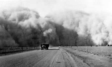 Depression to Dust Bowl: a large cloud appears behind a truck travelling on Highway 59 in Colorado, May 1936.