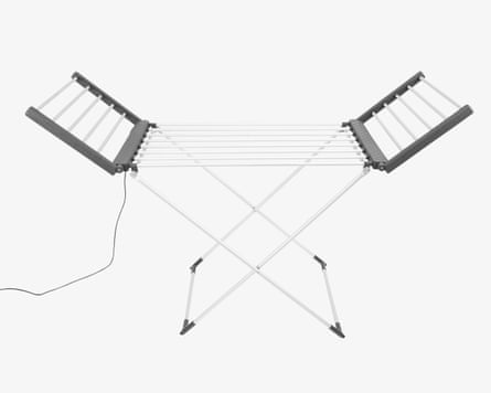 A folding heated clothes airer with multiple white bars and a power cord stands open