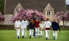 Junior girls take to the field for a cricket match with their coach in Wiltshire, England. Image shot 2015. Exact date unknown.<br>EPMW90 Junior girls take to the field for a cricket match with their coach in Wiltshire, England. Image shot 2015. Exact date unknown.